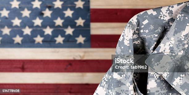 Military Uniform With Faded Boards Painted In American Usa Flag Stock Photo - Download Image Now