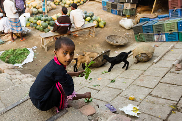 Dhaka, Bangladesh - September 17, 2007: Unidentified people on traditional street market in the capital