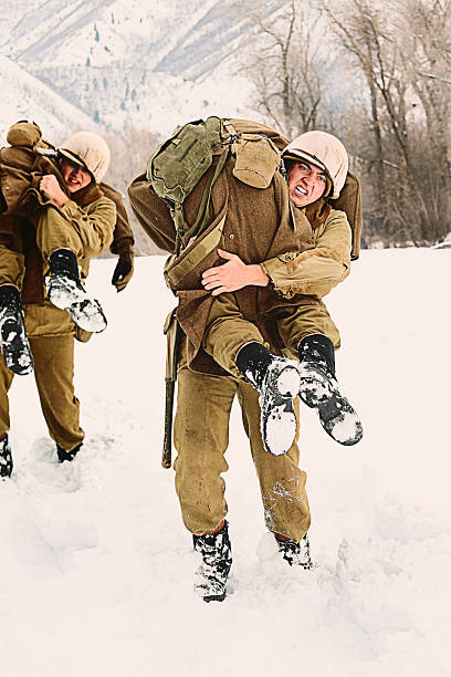 istock WWII Soldiers Carrying the Wounded 514779594