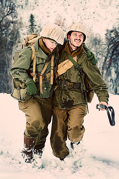 istock WWII Soldiers Assisting the Wounded 514779652