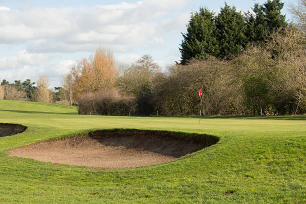 istock Golf Green And A Sand Bunker On A Sunny Day 514780314