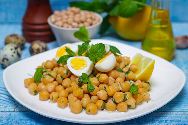 istock Dish of chickpeas with mint, olive oil and lemon 514780832