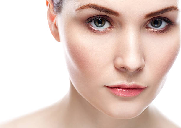 istock Beautiful woman face close up portrait studio on white 514782686