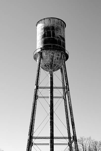 istock Old rusted water tank on stilks in bad condition 514786458