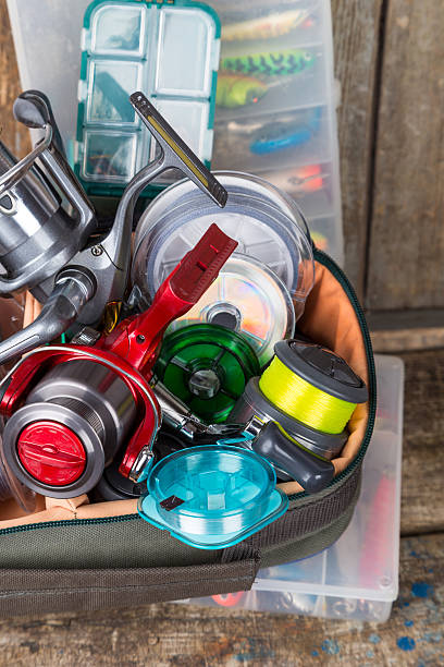 istock fishing tackles, lures and baits in boxes 514787444