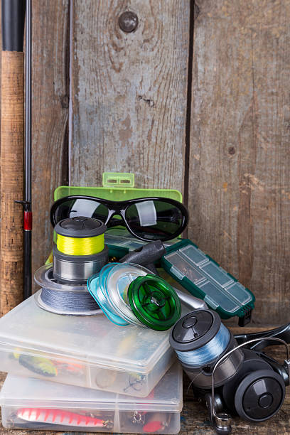 istock fishing tackles, lures and baits in boxes 514788130