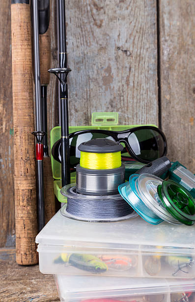 istock fishing tackles, lures and baits in boxes 514788368