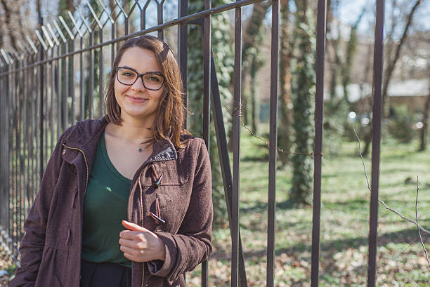 istock Young woman in park 514788900