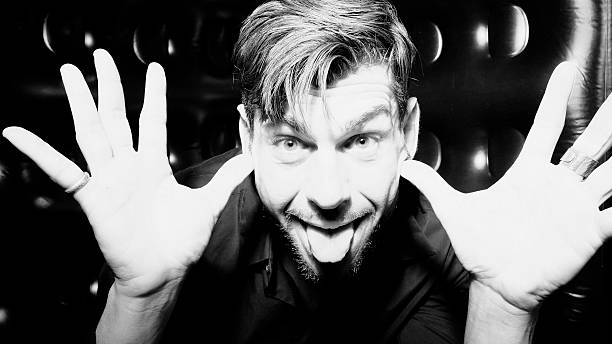 istock close-up of a funny man grimacing at the camera 514790066