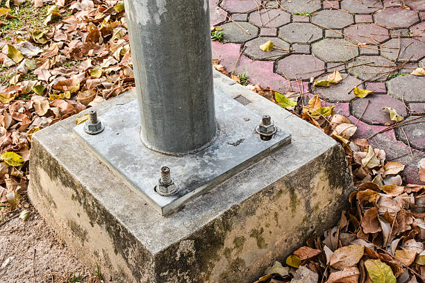 istock Structural detail of a lighting post steel base plate. 514790482