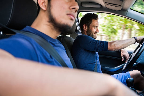 istock Friends sitting in the car ready to start vacations 514791542