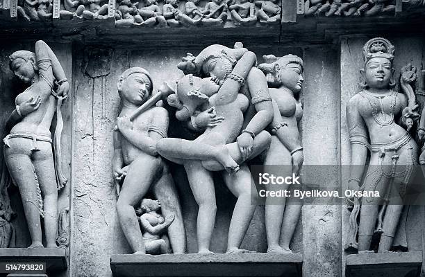 Stone Carved Erotic Basrelief In Hindu Temple In Khajuraho Ind Stock Photo - Download Image Now