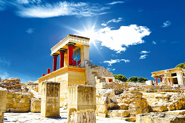 Knossos palace at Crete, Greece Knossos Palace Crete, Greece - April 27, 2013 : Knossos palace of the Minoan civilization and culture at Heraklion, Crete, Greece  crete stock pictures, royalty-free photos & images