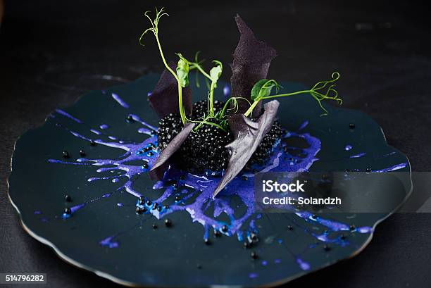 Risotto With Cuttlefish Ink And Black Caviar Stock Photo - Download Image Now - Food, Gourmet, Luxury