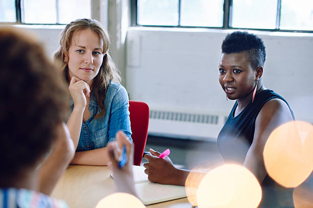 istock Unposed group of creative business people in an open concept 514796294