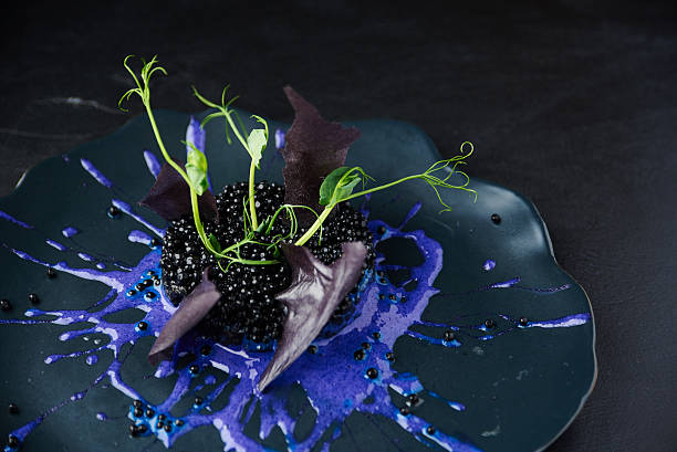 istock Risotto with cuttlefish ink and black caviar 514796388