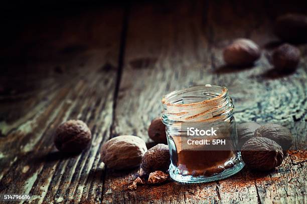 Ground Or Whole Nutmeg Stock Photo - Download Image Now - Brown, Close-up, Condiment