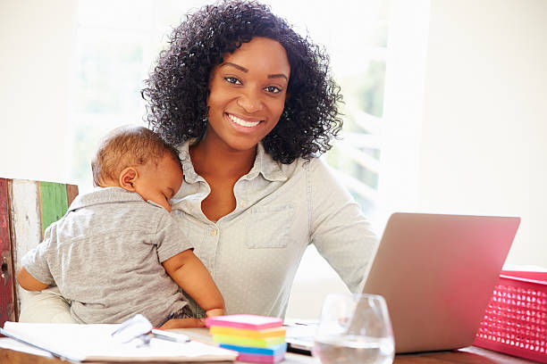istock Mother With Baby Working In Office At Home 514797355