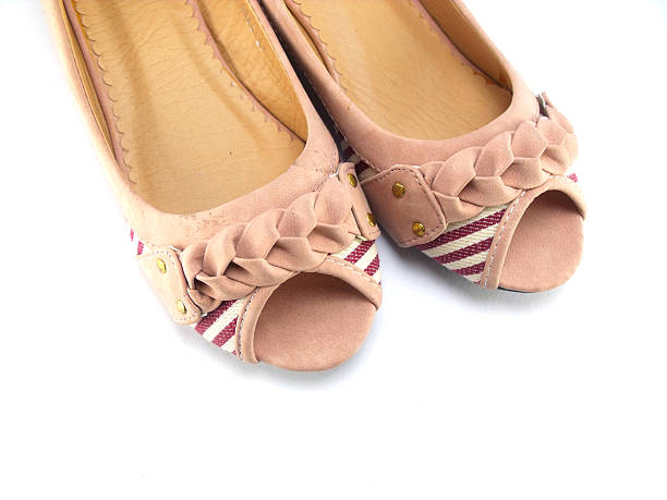 istock lady shoes isolated on white background 514798649