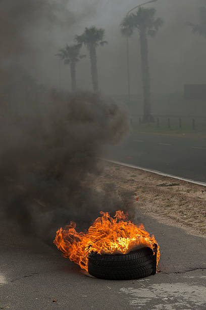 istock Burning tires in a riot 514798785