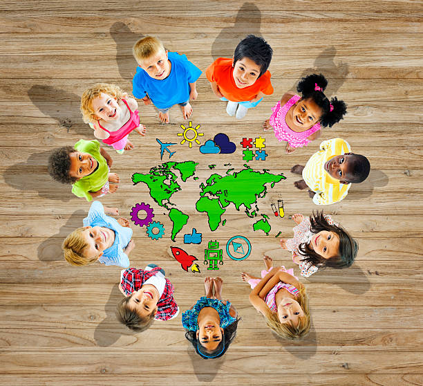 istock Multiethnic Group of Children with World Map 514799455