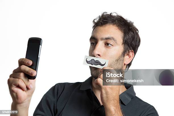 Casual Man Make Selfie Portrait With Fake Moustache Stock Photo - Download Image Now