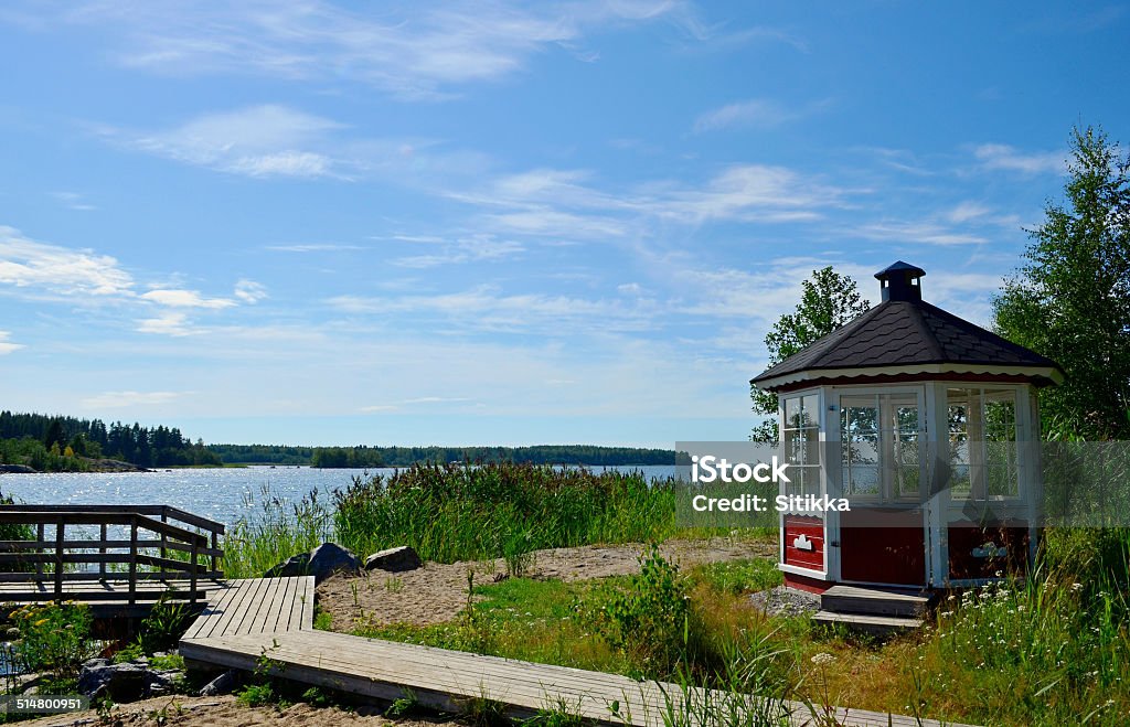 Beach house Small beachouse and pier on seaside At The Edge Of Stock Photo