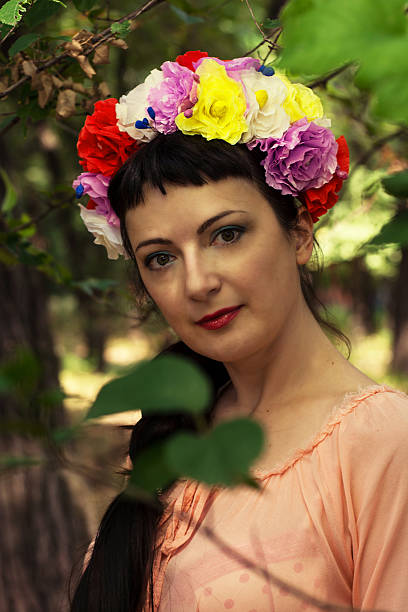 istock woman with a wreath on his head 514802811