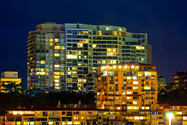 istock Apartment buildings at night, Sydney Australia, copy space 514826588