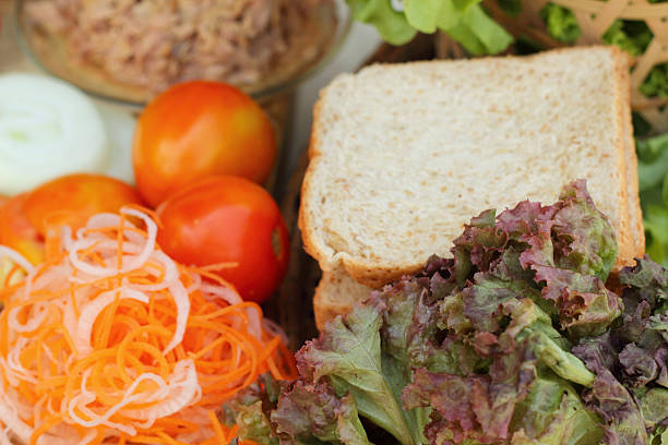 istock making tuna sandwich with fresh vegetables 514826637