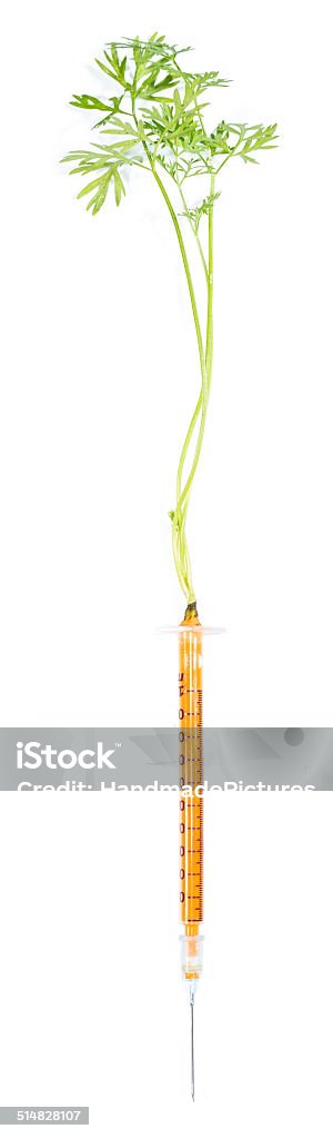 Carrot Injection (over white) Carrot Injection isolated on pure white background Addiction Stock Photo