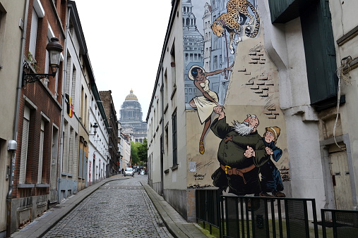 Brussels, Belgium - July 11, 2014: Filtered picture of a comic strip mural painting on July 11, 2014 in Brussels, Belgium. Brussels is known as a homeland of the comic strips and is full of images of numerous comic strip heroes.