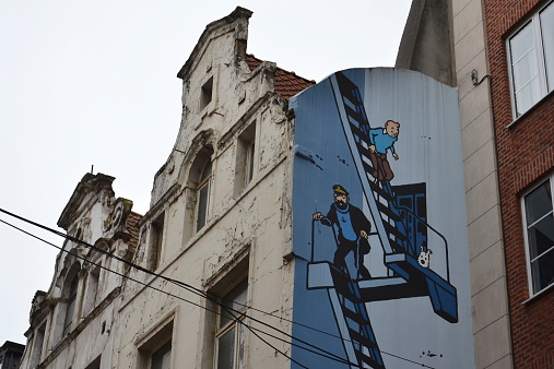 Brussels, Belgium - July 11, 2014: Filtered picture of a comic strip mural painting on July 11, 2014 in Brussels, Belgium. Brussels is known as a homeland of the comic strips and is full of images of numerous comic strip heroes.