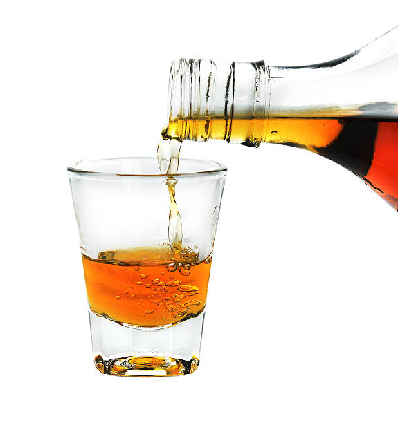 istock pouring whisky into glass 514829066