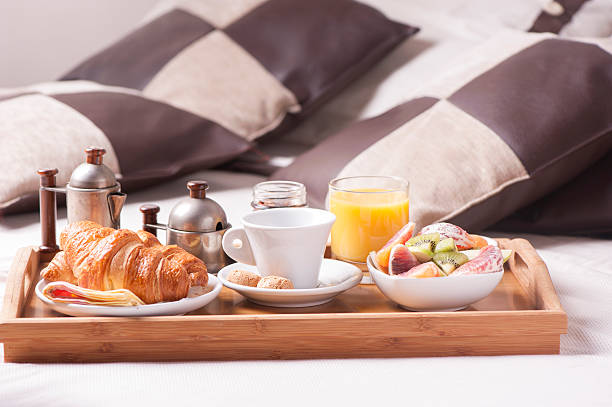 istock Breakfast in bed at a hotel room 514829348