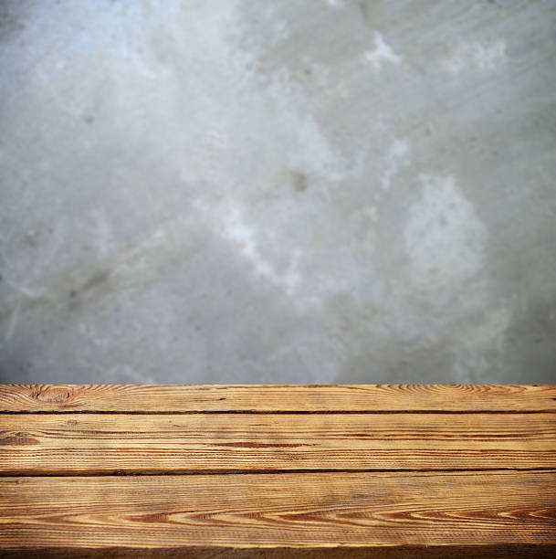 istock Defocused concrete background and a wooden background 514829732