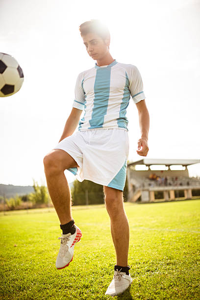 istock Soccer player playing with soccer ball 514831332