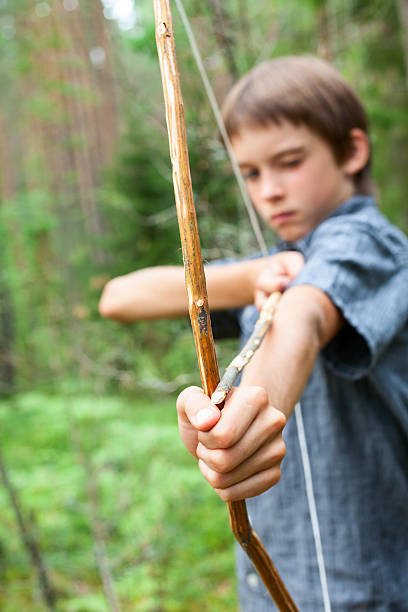 istock Kid with homemade bow and arrow 514831551