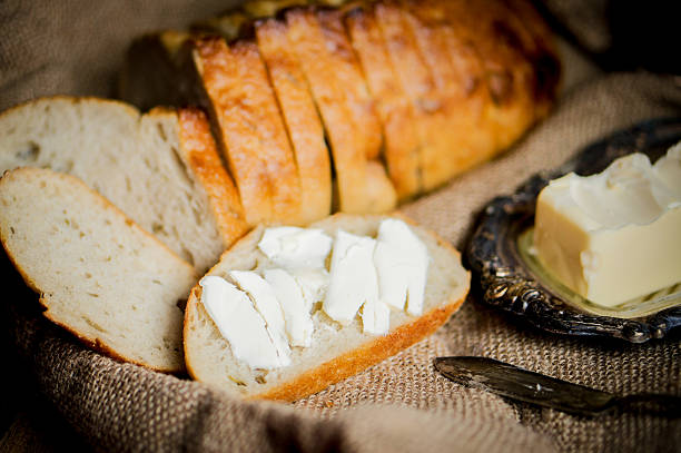 istock Sliced fresh bread on wooden background,vintage 514831968