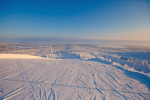 Beautiful vibrant sunny scandinavian winter landscape of skiing resort