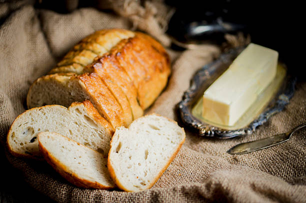 istock Sliced fresh bread on wooden background,vintage 514832370