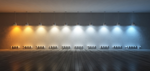 3Ds rendered image of 10 hanging lamps which use different bulbs. Color temperature scale. spectrum color on the cracked concrete wall and wooden floor