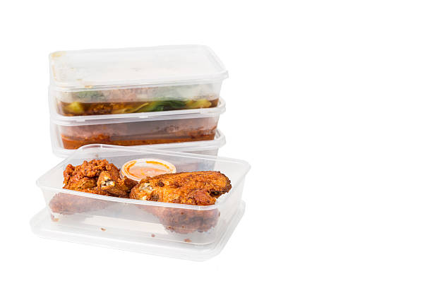 istock Convenient but unhealthy disposable plastic lunch boxes with mea 514835760