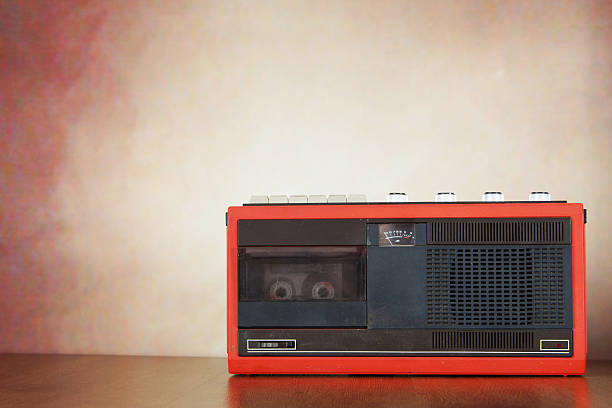 istock Old cassette player on a wooden surface 514837460