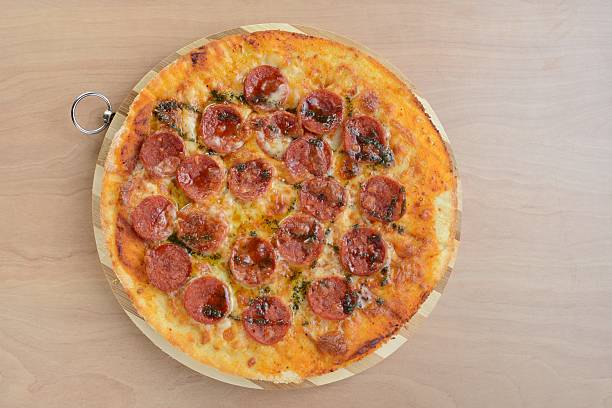 istock Freshly-baked pepperoni pizza 514837600