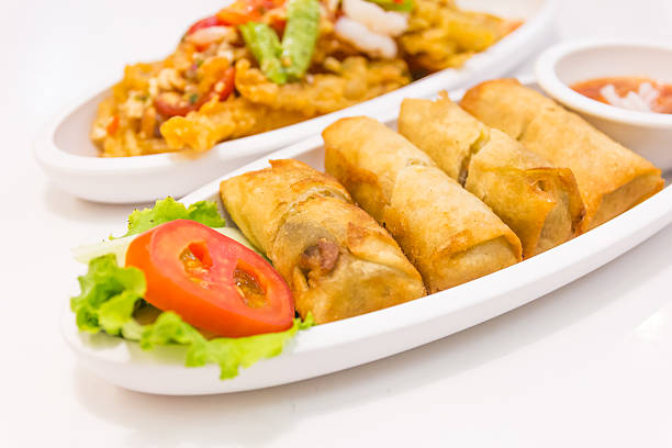 istock Fried Chinese Traditional Spring rolls food isolated 514840102