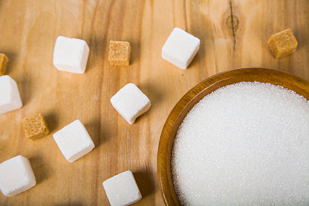 istock Sugar in a wooden bowl 514840226