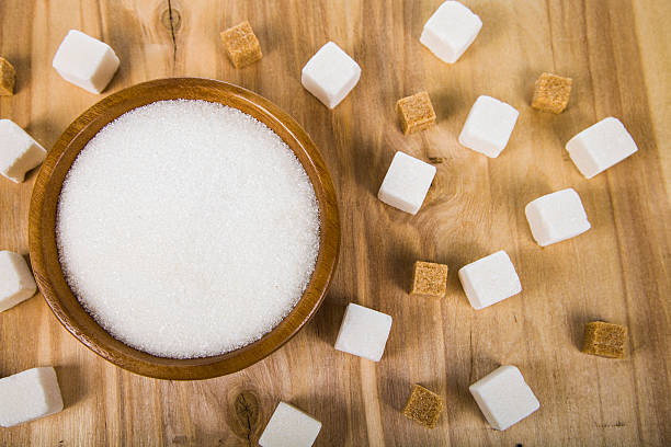 istock Sugar in a wooden bowl 514840252