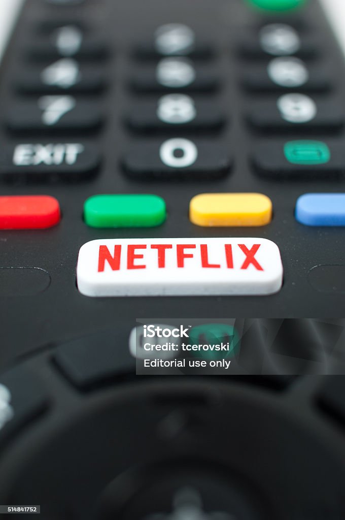 Smart TV remote control with Netflix button. Zagreb, Croatia - March 5, 2016: Smart TV remote control with Netflix button. Netflix Stock Photo