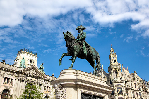 Monument of King Peter IV was built in 1866 in the middle of the Liberdade square in Porto, Portugal. The monument, by French sculptor Anatole Calmels, consists of a statue of Peter IV riding a horse and holding the Constitution that he had fought to protect during the Liberal Wars. (Porto, Portugal)